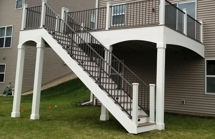 Decorative columns with arched brackets on elevated deck