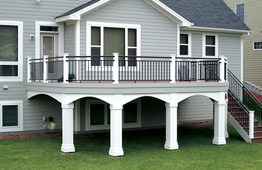 White decorative columns supporting elevated deck