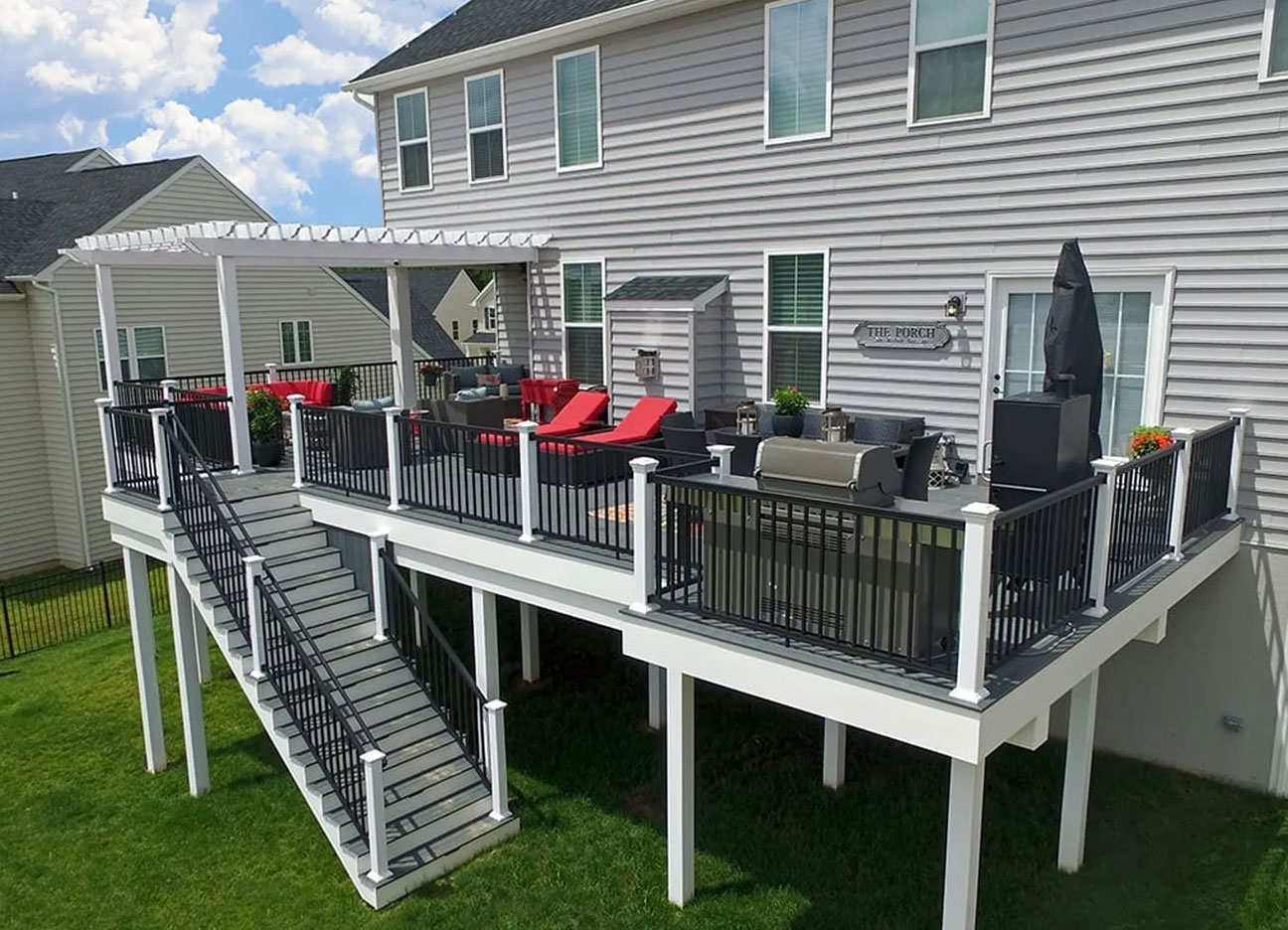 Elevated deck with pergola creating outdoor living space