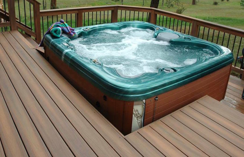 Composite deck with recessed hot tub installation